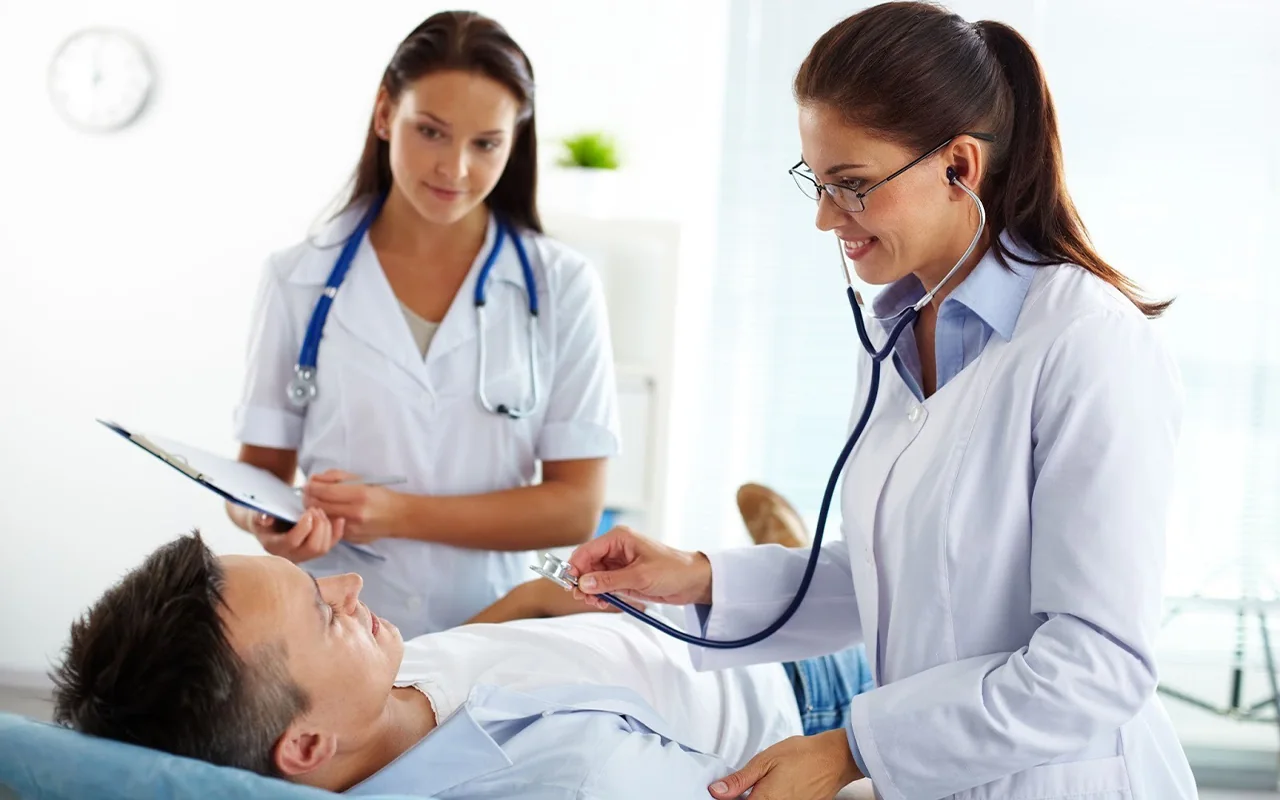 Doctors attending to a patient