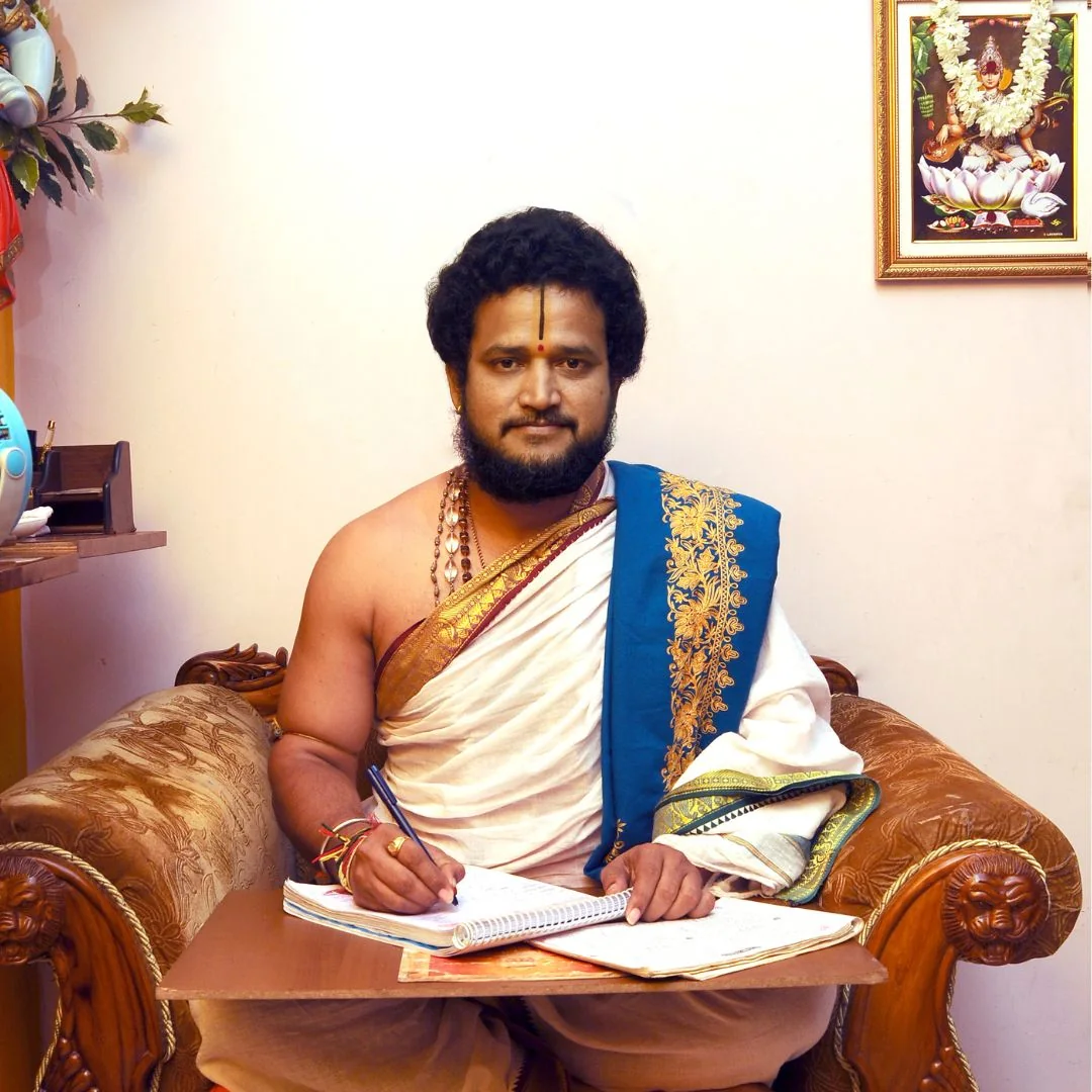 Pandit Hampi Ravishankar Shastri seated in his office